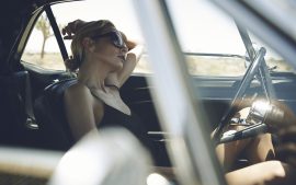 Thumbnail Girl waiting in a Ford Mustang by Stefan Rappo