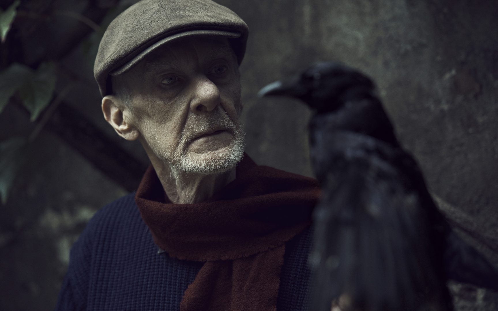 Man with crow by Stefan Rappo