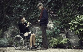Thumbnail man giving a rose to women in wheelchair by Stefan Rappo