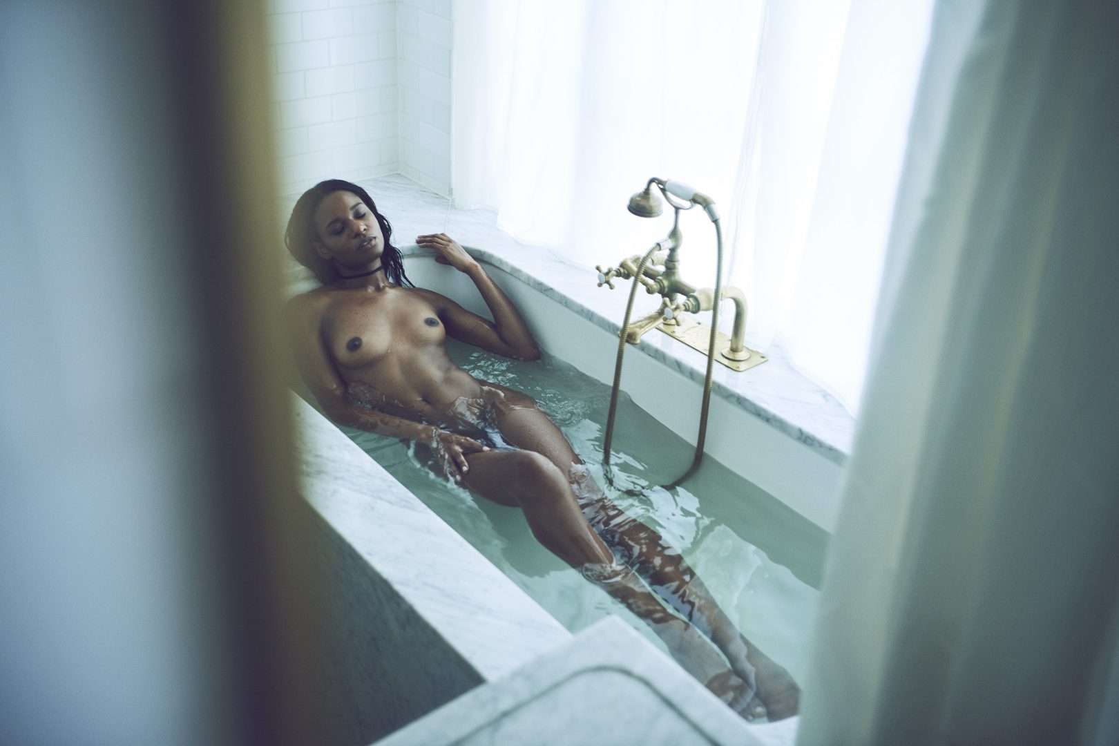 Naked black girl taking bath in hotel room by Stefan Rappo