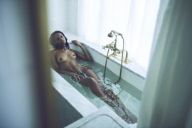 Thumbnail Naked black girl taking bath in hotel room by Stefan Rappo