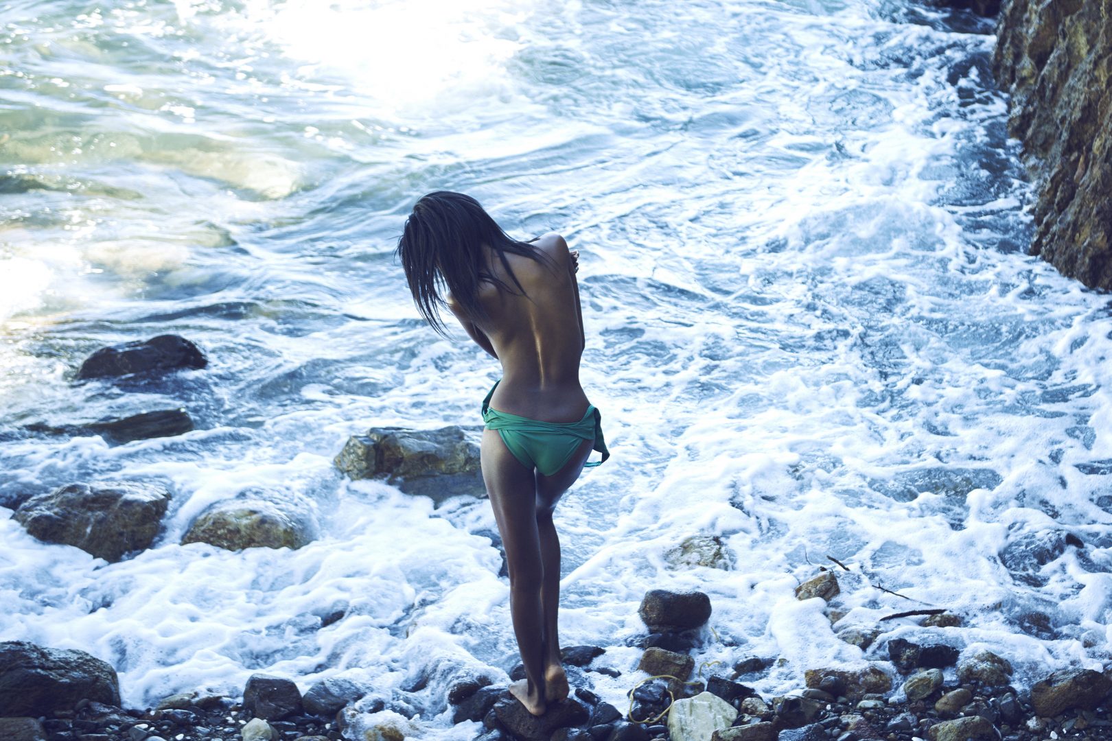 Girl in front of sea in swimsuit by Stefan Rappo
