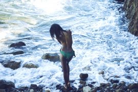 Thumbnail Girl in front of sea in swimsuit by Stefan Rappo
