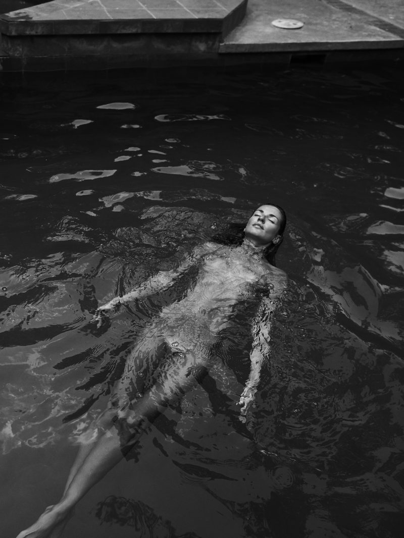 Naked girl poolside by stefan rappo