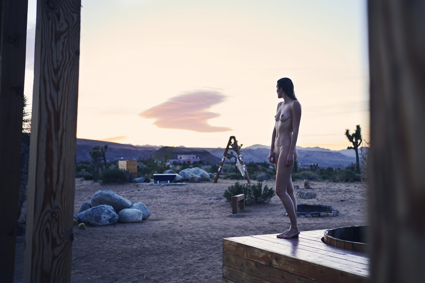naked girl watching sunset