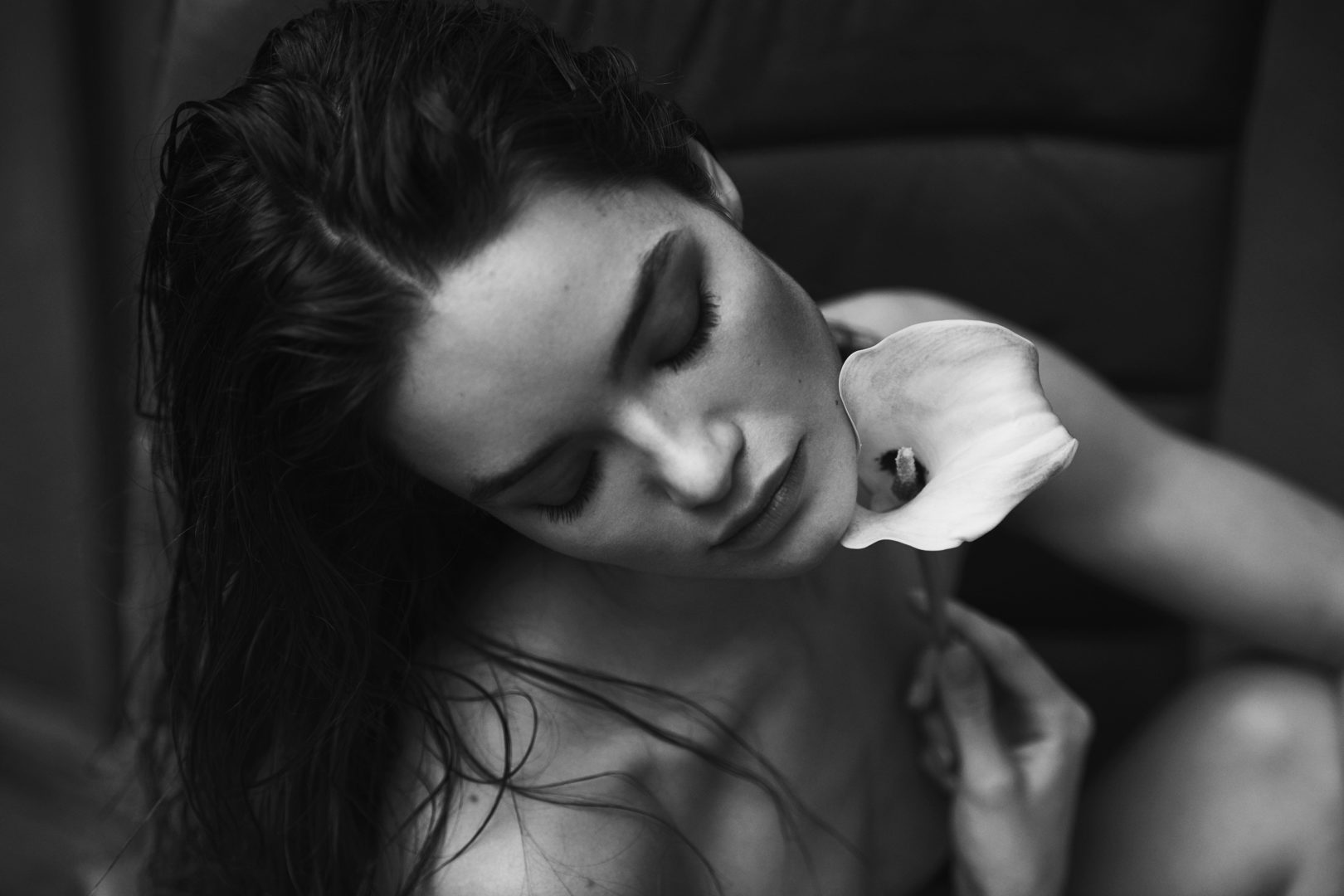 naked girl holding a flower