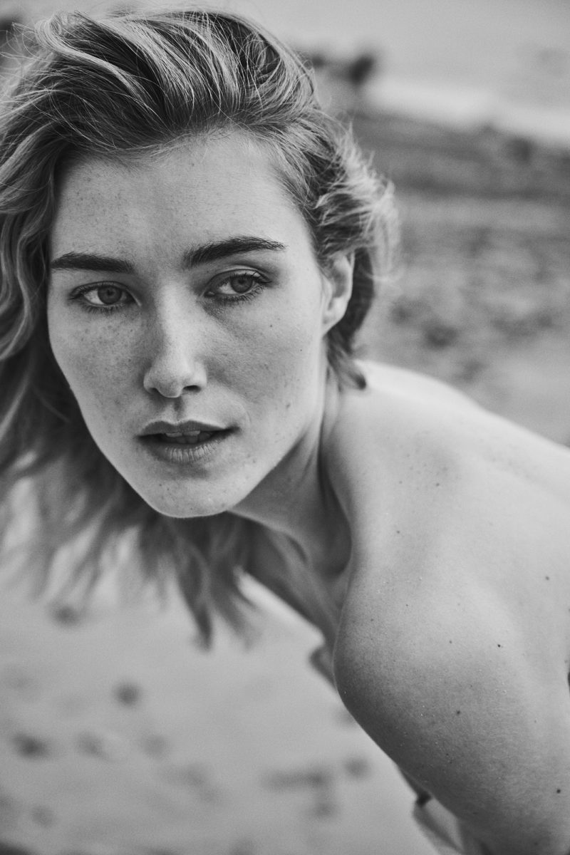 Girl on beach by Stefan Rappo